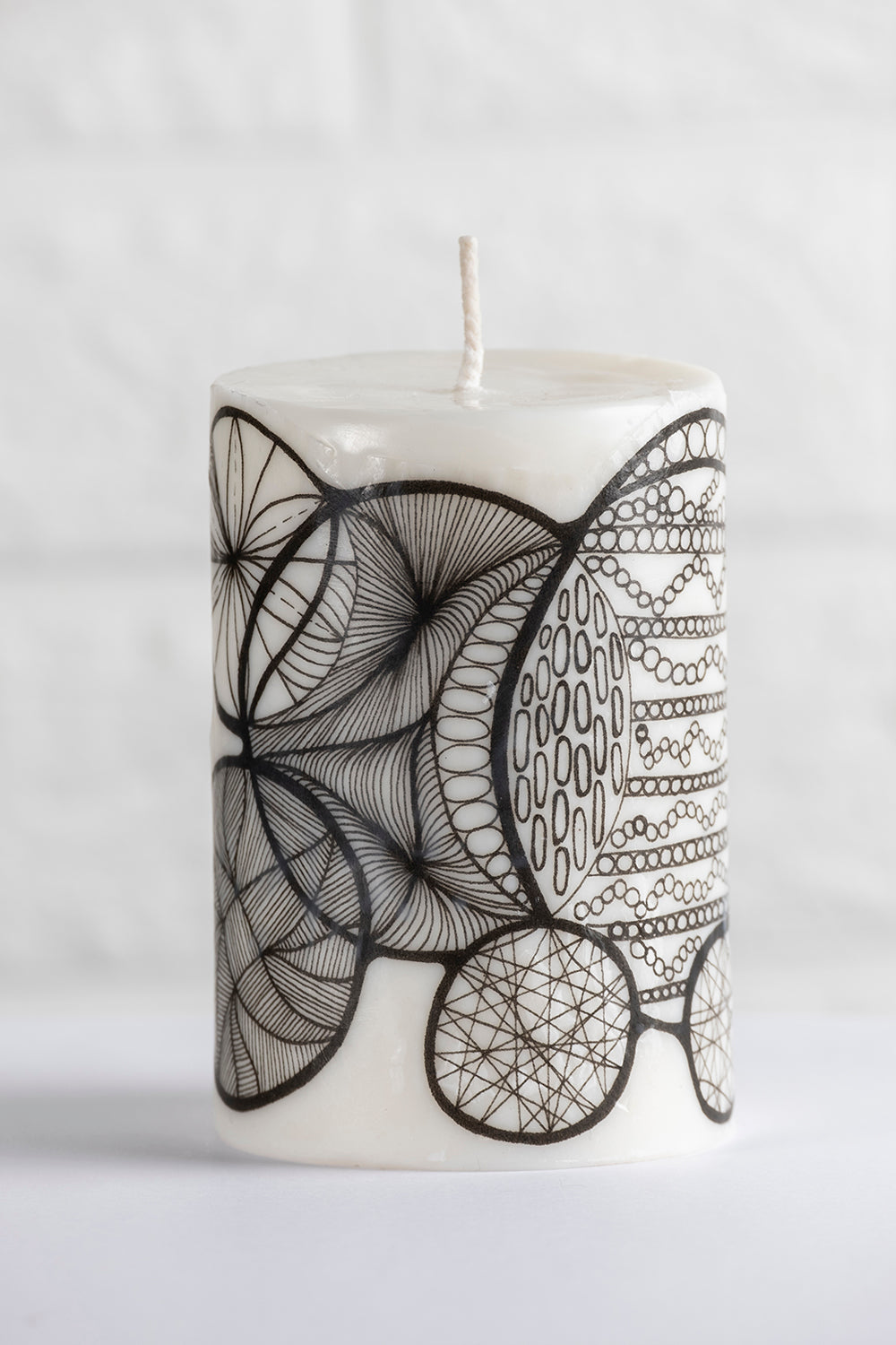 Unscented white vegetable wax pillar candle with drawing