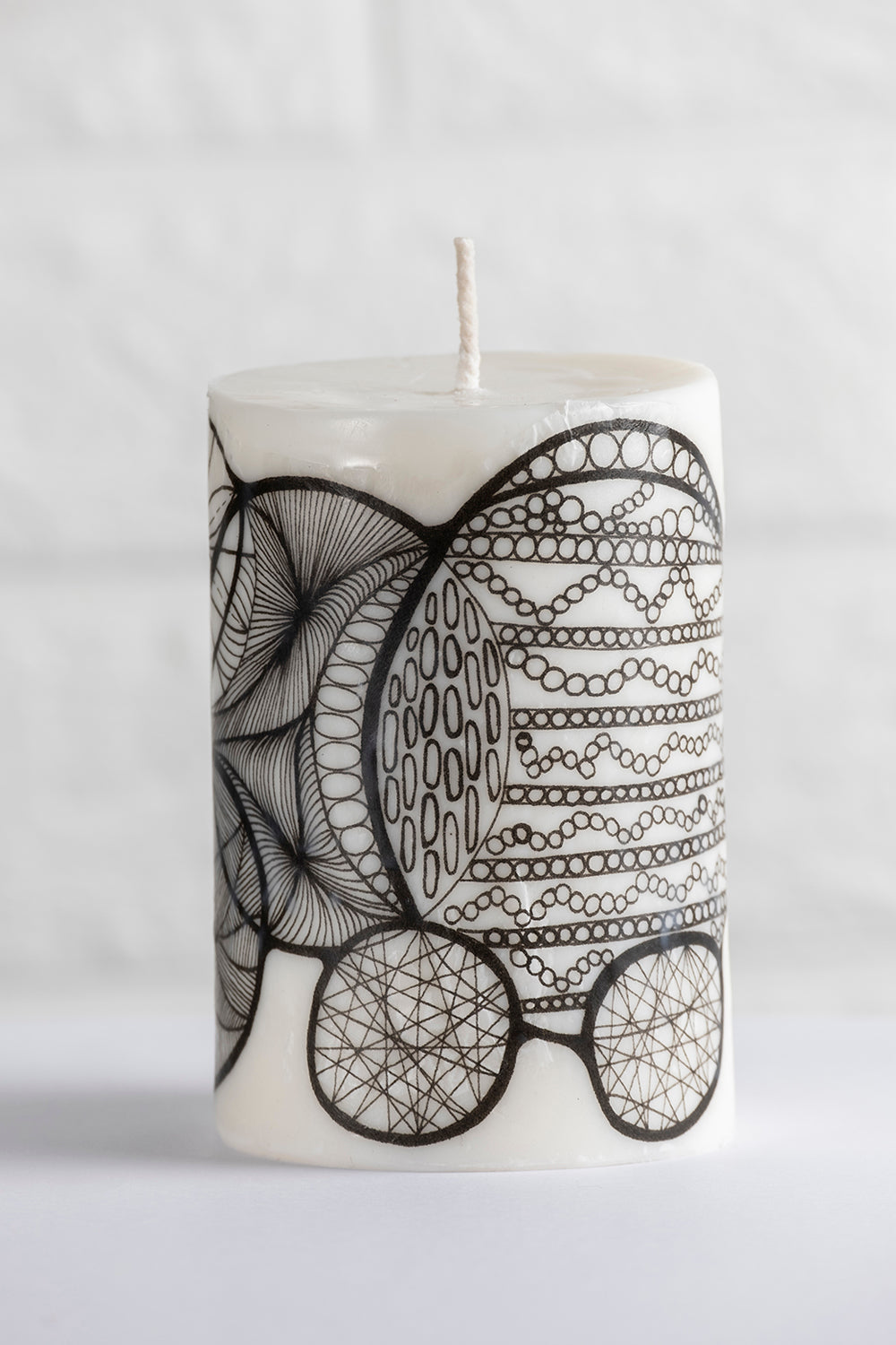 Unscented white vegetable wax pillar candle with drawing