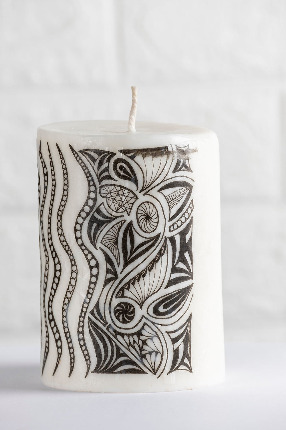 Unscented white vegetable wax pillar candle with drawing