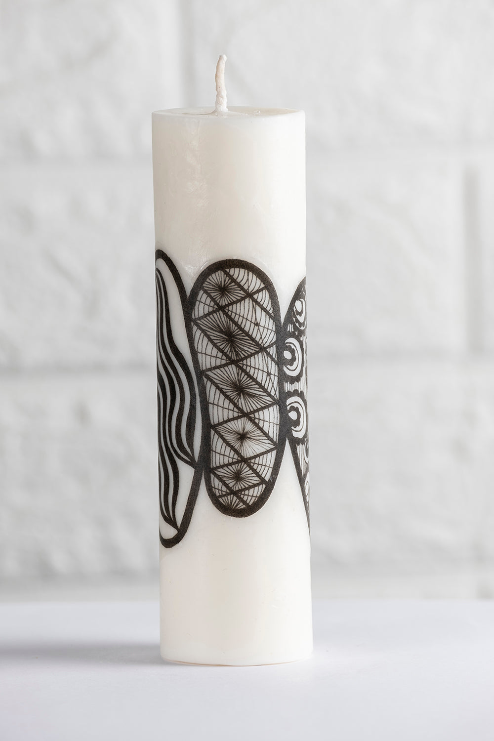 Unscented white vegetable wax pillar candle with pattern