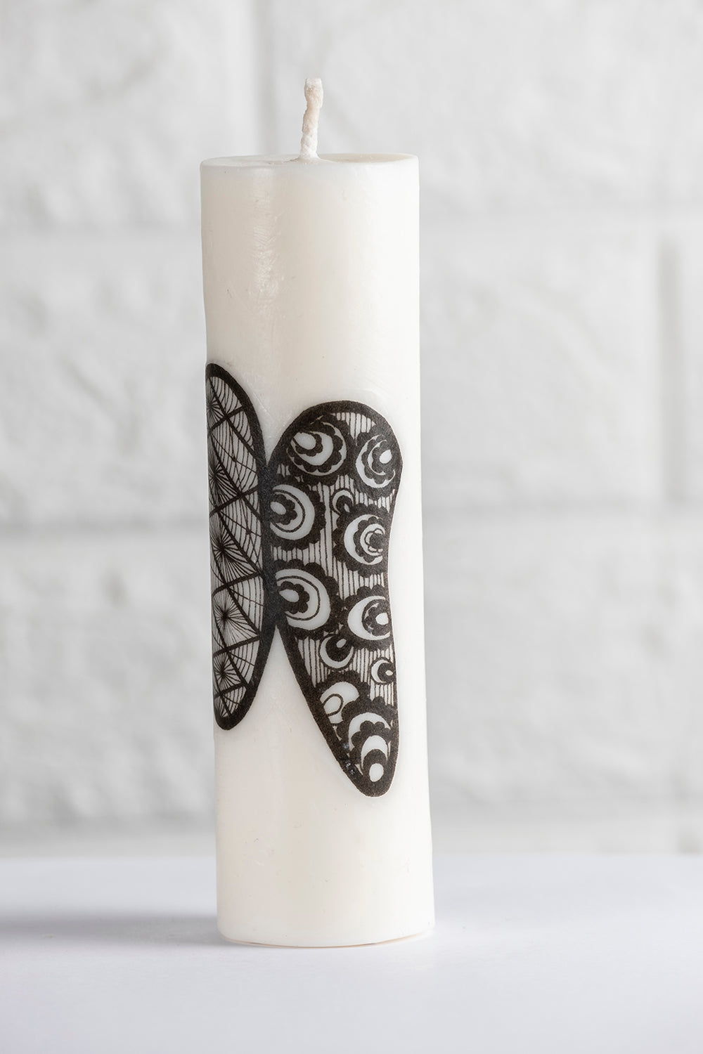 Unscented white vegetable wax pillar candle with pattern