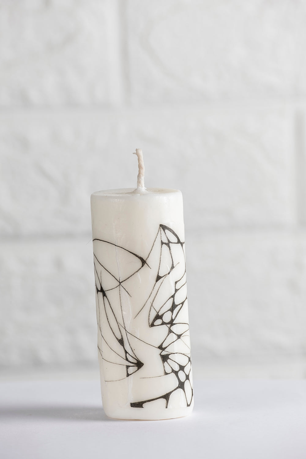 Unscented white vegetable wax pillar candle with drawing