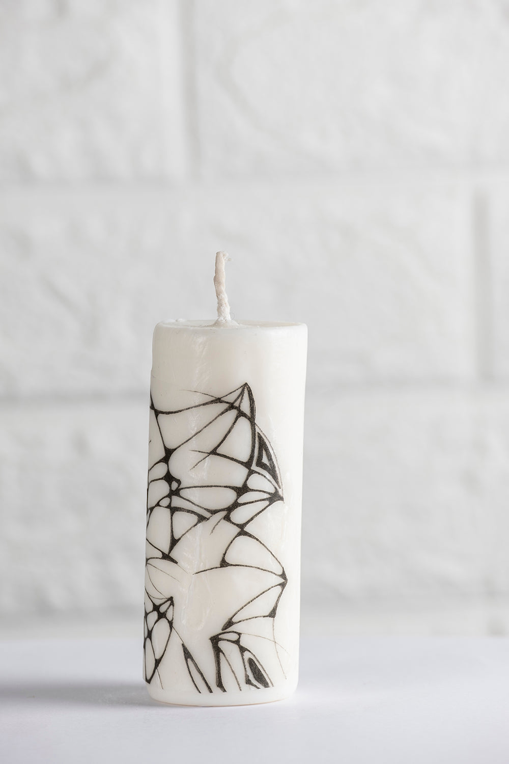 Unscented white vegetable wax pillar candle with drawing